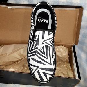 pair of slip on canvas shoes